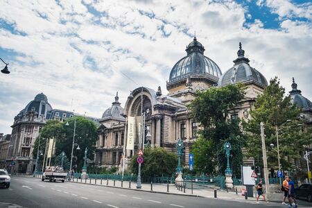 Bucharest, Romania - September 9, 2017: People visiting and walking near CEC Palace, Palace of the...