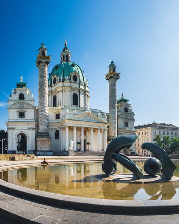 St Charles Church or Karlskirche in Vienna, Austria. Summer panoramic view, beautiful architecture and famous landmark of Viennaの写真素材