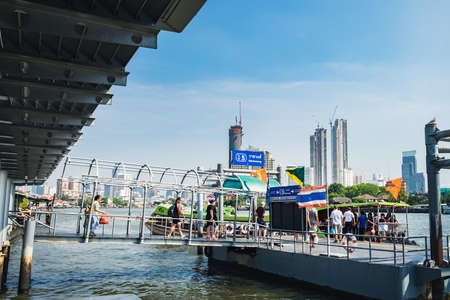 Bangkok, Thailand - March 2, 2018: Crowd of people on Ratchawong Pier, stop on Route of Chao Phraya Express Boat in Bangkok, Thailandのeditorial素材