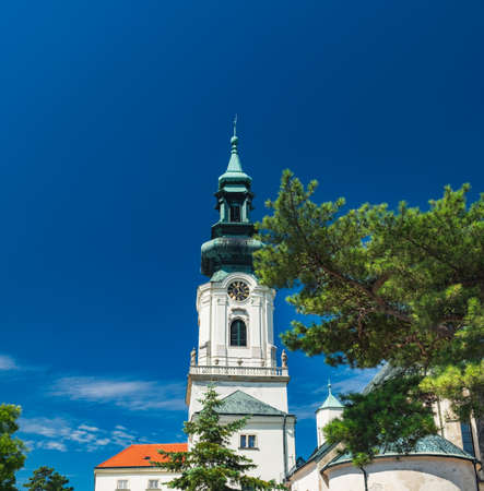 Nitra Castle located in Old Town of Nitra, Slovakia. Main entrance, Tower of Castle with clock under blue sky in beautiful summer dayのeditorial素材