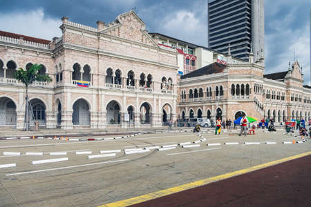 Kuala Lumpur, Malaysia - February 7, 2016: Kids training and riding mini-bikes near Sultan Abdul Samad Building in front of Independence Squareのeditorial素材