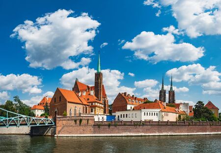 Famous Polish tourist destination in Wroclaw. Cathedral Tumski Island on Oder river is the oldest part of the Wroclaw, Poland.の写真素材