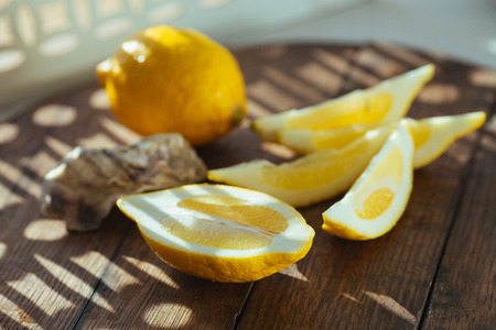 Lemon on a wooden boardの写真素材