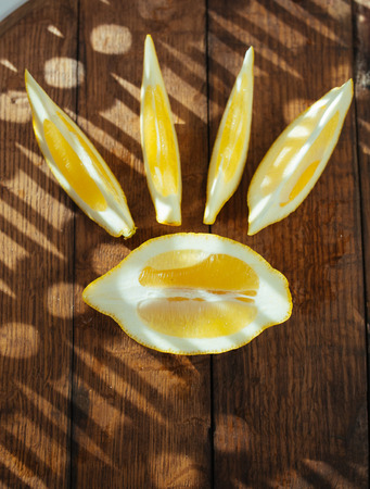 Lemon on a wooden boardの写真素材