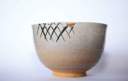 gold patch karatsu ware bowlの写真素材