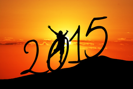 new year  silhouette on the hill and  a manの写真素材