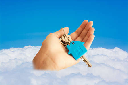 Concept image of key on skyの写真素材