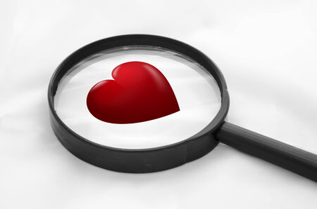 Red Heart in the magnifierの写真素材