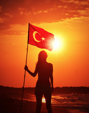 Woman Holding Turkish flagの写真素材