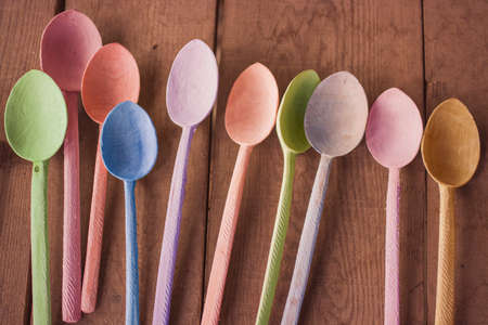 wooden spoon on deskの写真素材