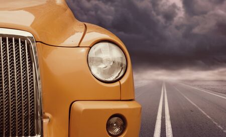 yellow car headlightの写真素材