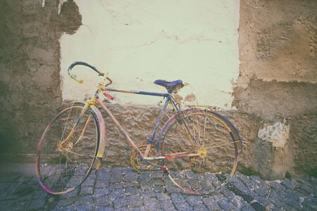vintage bicycle. Retro stylish cycling in townの写真素材