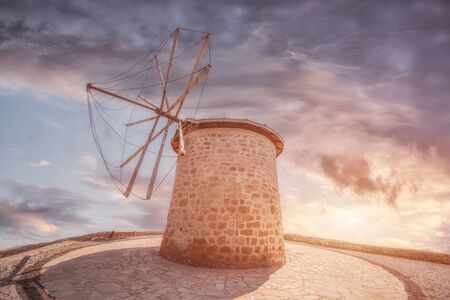 old stone mill in a village Alacati, Turkeyの写真素材