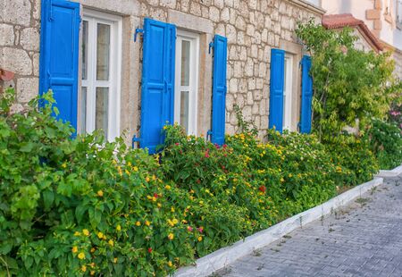Typical greek traditional village with  colorful doors, windows and balconies on Mykonos Island, Greece, Europeの写真素材