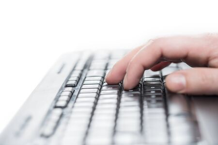 Businessman typing on keyboard.