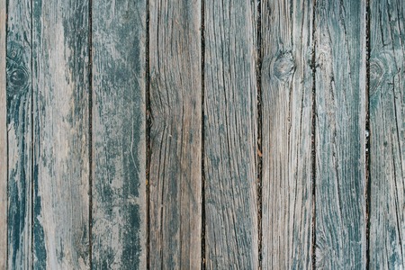 Old wooden barn board with a distressed surface