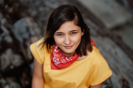 Beautiful smiling girl enjoying warm summer weather.の写真素材