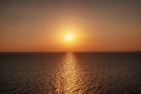 Beautiful sunset over the ocean. Sunrise in the sea.の写真素材
