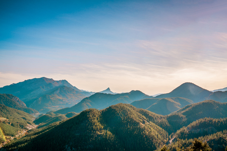 Majestic sunset in the mountains landscape. Dramatic sky.の写真素材