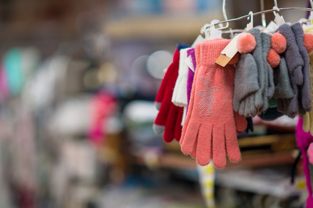 Warm Colorful Knitted Gloves On The Marketの写真素材