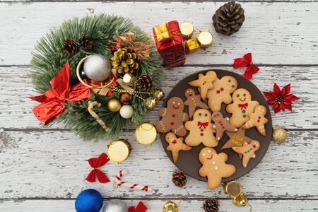 Serving traditional gingerbread cookies with ornaments for christmas celebration.
