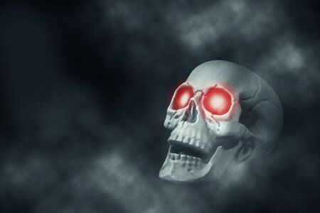 Skull with red eyes on isolated black background