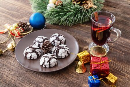 Perparing traditional cookies and gluhwein or mulled wine for new year celebration.の写真素材