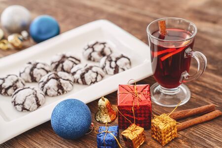 Perparing traditional cookies and gluhwein or mulled wine for new year celebration.の写真素材