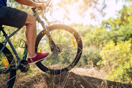 Riding mountain bike in the forest for a healthy life.の写真素材