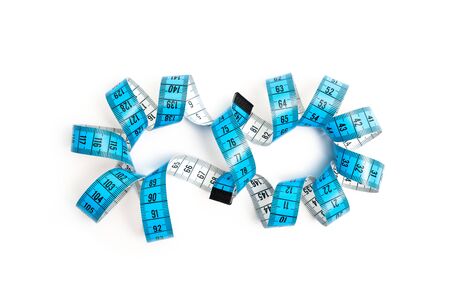 A object about Sewing measuring tape with eternity shape on a isolated white background. Sewing and...