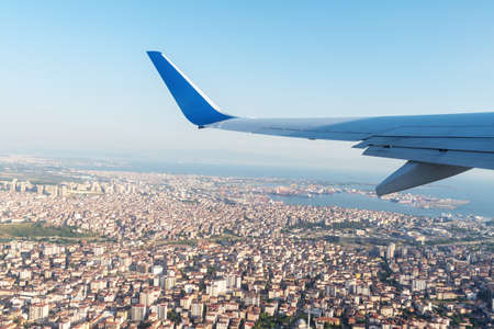 A panoramic top view from a n airplan of the beautiful city Istanbul and the Bosphorus under the blue sky. Banner, wallpaper conceptの写真素材