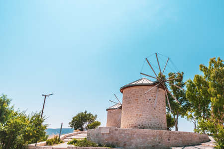 An old classic wind mill in a traditional, rural and beautiful town. . High quality photo