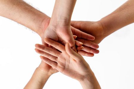 Hands of a group people who make teamwork for success to achievement . High quality photoの写真素材