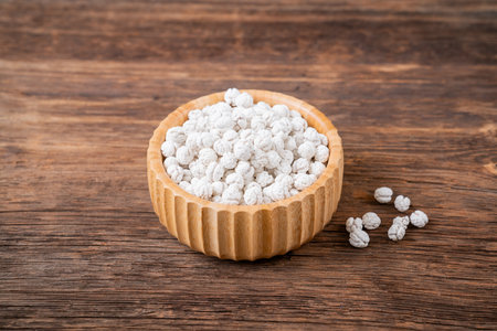 White Roasted Chickpeas with Sugar in wooden Bowl.の写真素材