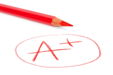 mark A+ with red pencil isolated on whiteの写真素材