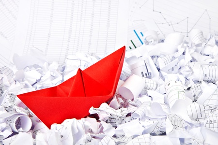 Business concept of paper boat and documents
