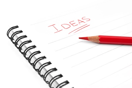 Blank sheet of paper, word Ideas and red pencil - concept business background