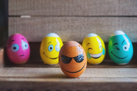 Multicolored eggs with facesの写真素材