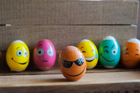 Multicolored eggs with facesの写真素材