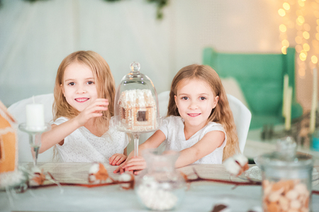 Ginger house for the New Year. The kitchen in bright colors is decorated for Christmasの写真素材