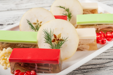 Jelly fish on white. Russian national cuisine meat aspic close up and copy space.