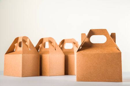 Sales of products. A lot of boxes on a white background close-up and copy space.The concept...