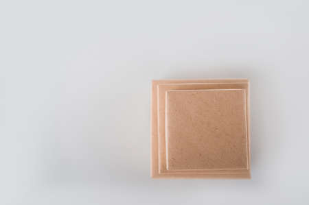 Cardboard boxes on a white background. Ecological packaging of paper products close-up and copy...