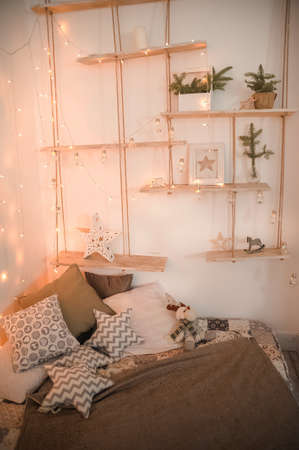 Scandinavian bedroom interior for the New Year. Background for a Christmas card in light colors of a...