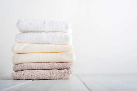 Stack of clean bath towels and copy space....の写真素材