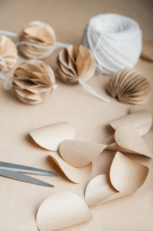 DIY Scandinavian Nordic Craft Paper Christmas Balls. Eco friendly New Year from handmade decor.の写真素材