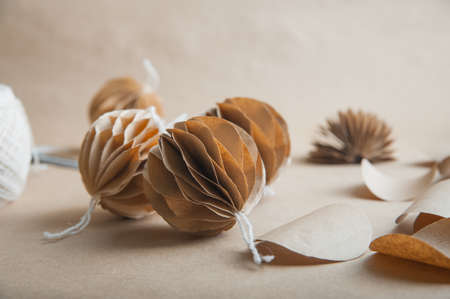 DIY Scandinavian Nordic Craft Paper Christmas Balls. Eco friendly New Year from handmade decor.の写真素材