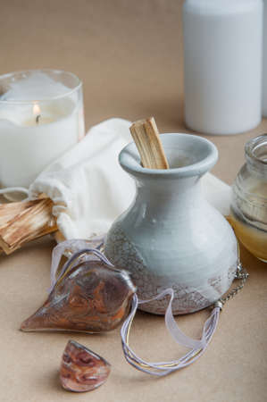Palo Santo bars close-up and copy space. Ritual cleansing with sacred ibiocai, meditation, aromatherapy with incense and candles.の写真素材