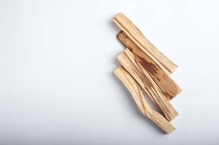 Palo Santo bars close-up and copy space. Ritual cleansing with sacred ibiocai, meditation,...