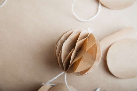 DIY Scandinavian Nordic Craft Paper Christmas Balls. Eco friendly New Year from handmade decor.の写真素材